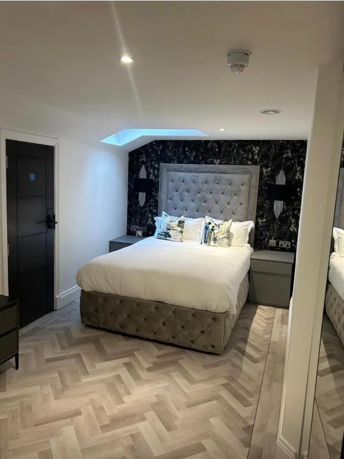 a bedroom with a large bed in a room at Philharmonic Hotel in Liverpool